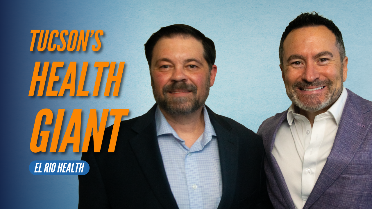 Clint Kuntz of El Rio Health with Upside Podcast host Edmund Marquez beside the words “Tucson’s Health Giant.”